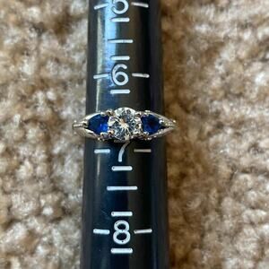 Silver ring with blue gems and diamonds centerpiece size 7